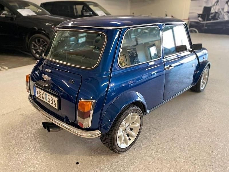 Begagnad Mini Cooper 63 HK (46 kW) 1996 Blåmetallic Halvkombi