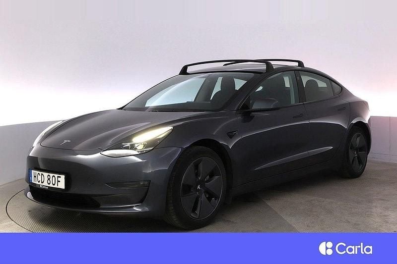 Grå Begagnad 2022 Tesla Model 3 Long Range Sedan | 339 900 kr (Marknadspris) - Bild 1/4