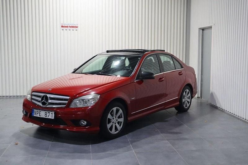 Ljusröd Begagnad 2010 Mercedes C180 AMG Sedan | 79 900 kr (Marknadspris) - Bild 1/4