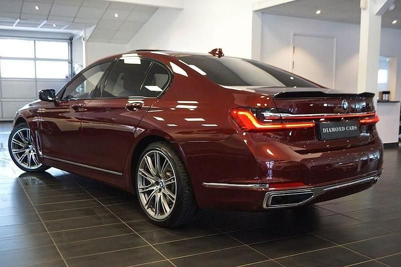 Begagnad BMW 745 Comfort Edition 394 HK (289 kW) 2021 Röd Sedan