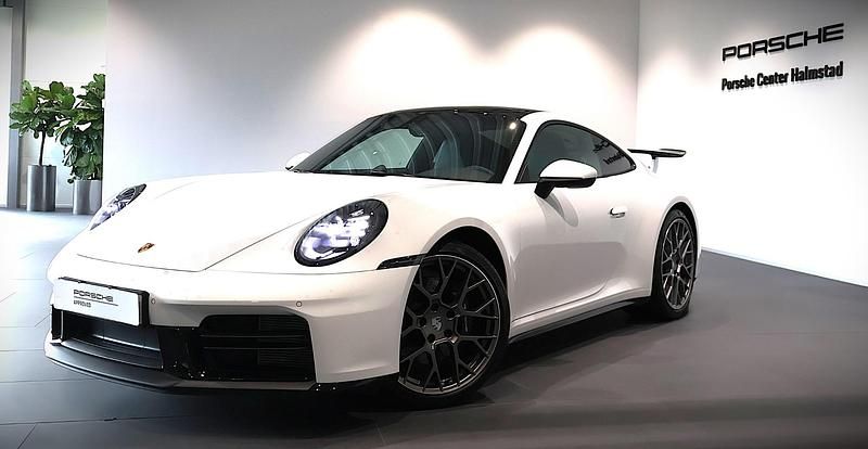 Vit (white) Begagnad 2024 Porsche 911 Carrera Sportkupé | 1 725 000 kr (Dyr) - Bild 1/4