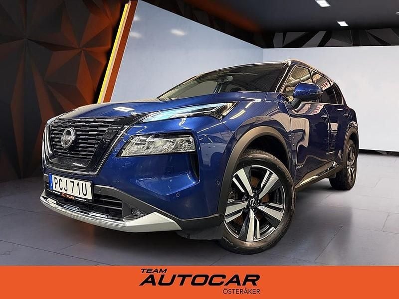 Blå Begagnad 2024 Nissan X-Trail Tekna SUV | 369 900 kr (Superpris) - Bild 1/4