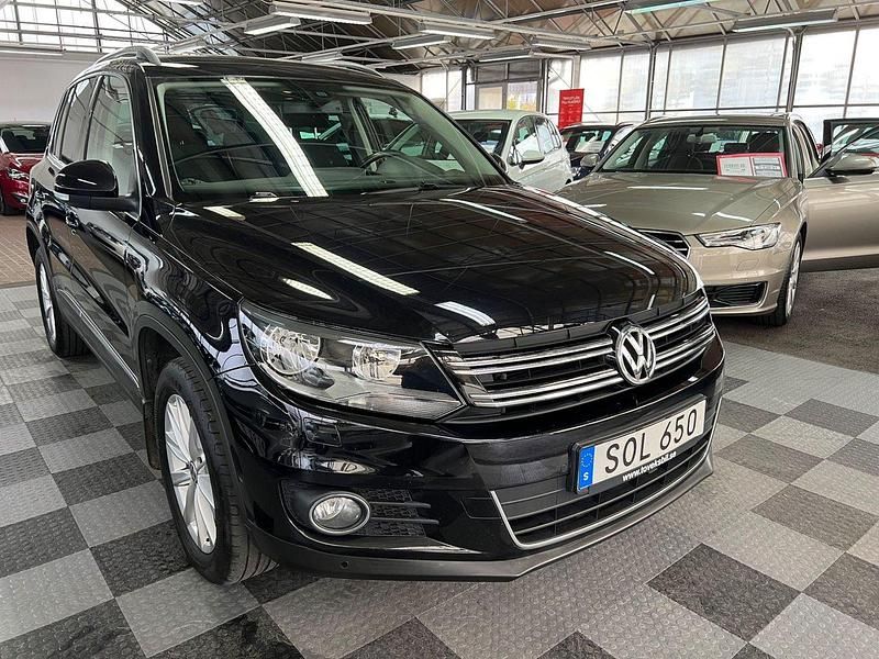 Svart Begagnad 2014 VW Tiguan Sportline SUV | 109 000 kr (Marknadspris) - Bild 1/4