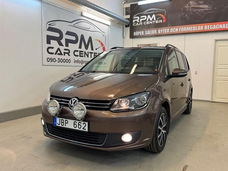 Brun Begagnad 2013 VW Touran Minibuss | 99 900 kr - Bild 1/4