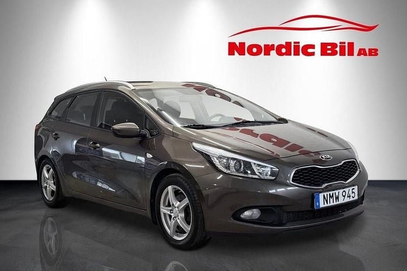 Ljusbrun (brun) Begagnad 2014 Kia Ceed Sportswagon EX Kombi | 79 900 kr (Bra pris) - Bild 1/4