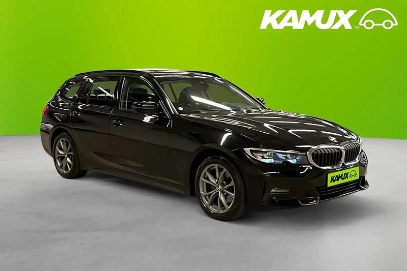 Svart Begagnad 2021 BMW 320 Kombi | 254 800 kr - Bild 1/4