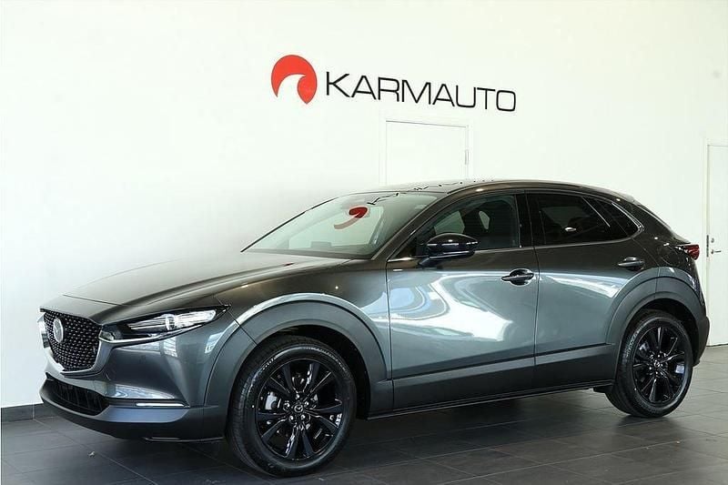Grå Ny 2025 Mazda CX-30 Homura-Line SUV | 362 100 kr (Marknadspris) - Bild 1/4