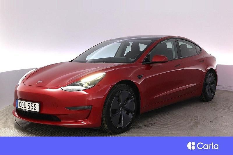 Röd Begagnad 2021 Tesla Model 3 Long Range AWD Sedan | 324 900 kr (Dyr) - Bild 1/4