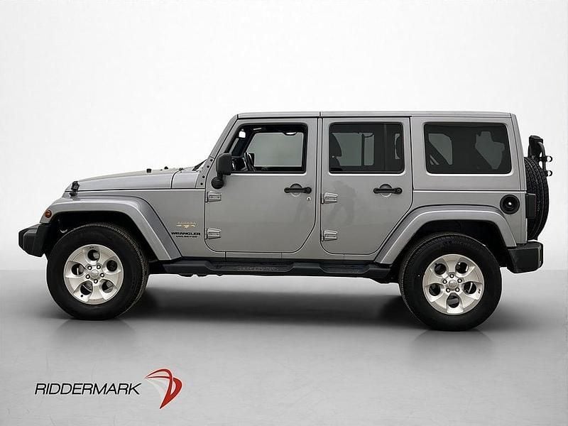 Begagnad Jeep Wrangler Unlimited Sahara 200 HK (147 kW) 2015 Grå SUV