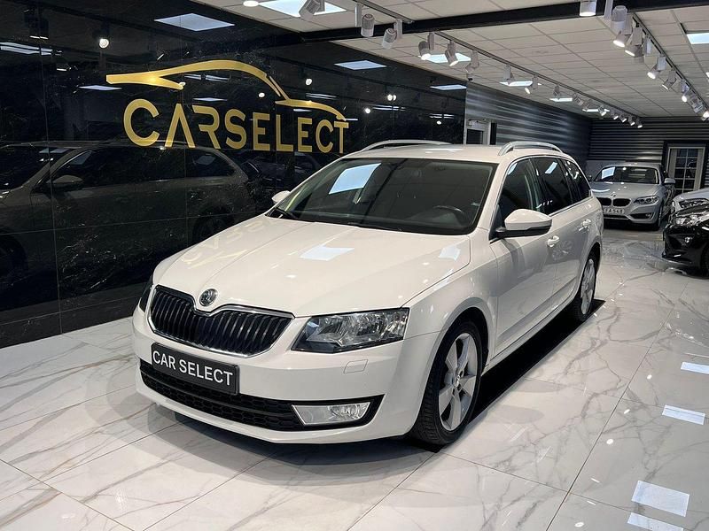 Vit Begagnad 2014 Skoda Octavia Kombi | 79 800 kr (Marknadspris) - Bild 1/4