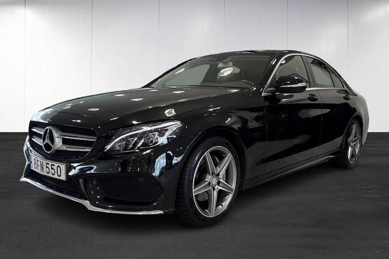 Svart (black) Begagnad 2014 Mercedes C220 AMG line Sedan | 209 900 kr (Marknadspris) - Bild 1/4