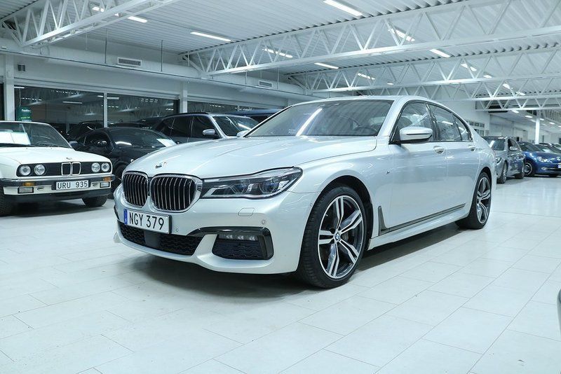Бмв 740 д
