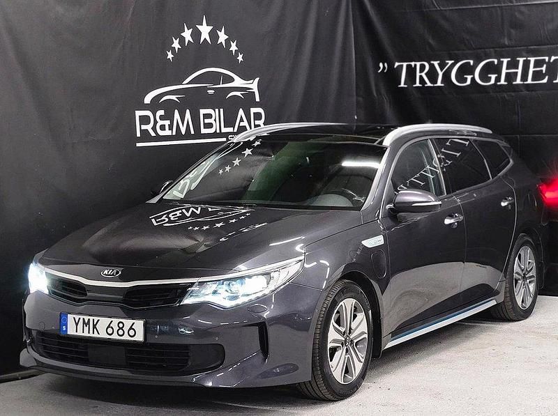 Grå Begagnad 2017 Kia Optima Hybrid Sedan | 164 800 kr (Marknadspris) - Bild 1/4