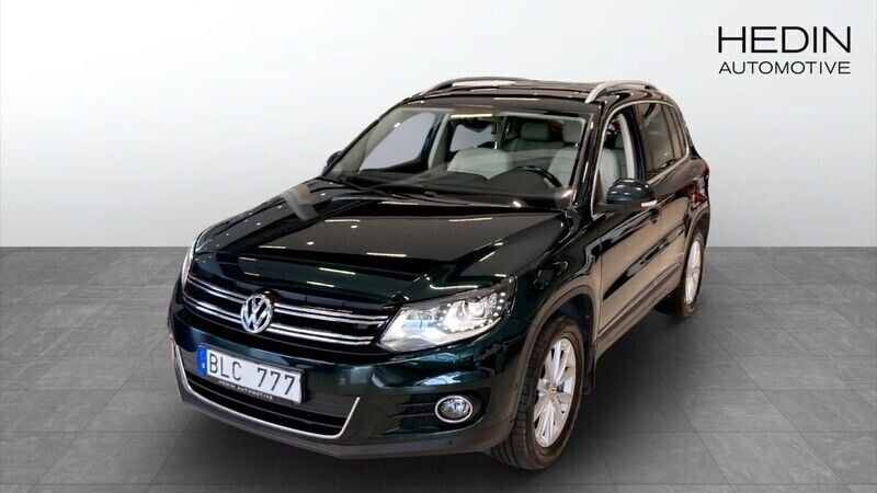 Mörkgrön (green) Begagnad 2013 VW Tiguan SUV | 168 800 kr (Marknadspris) - Bild 1/4