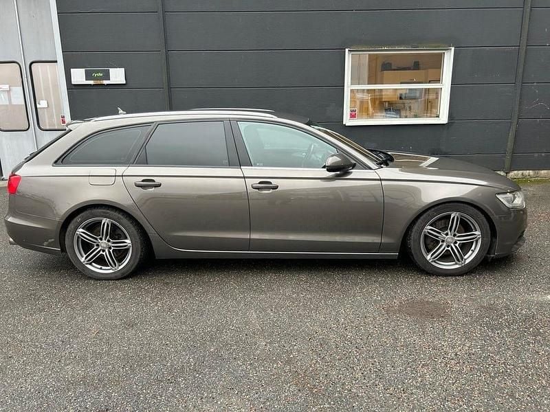 Grå Begagnad 2013 Audi A6 Ambition Kombi | 98 900 kr (Marknadspris) - Bild 1/4
