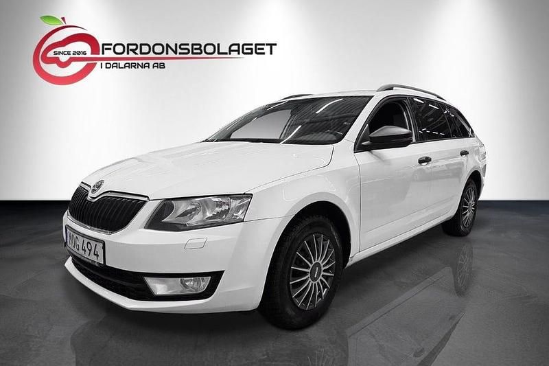 Vit Begagnad 2014 Skoda Octavia Kombi | 79 700 kr (Marknadspris) - Bild 1/4
