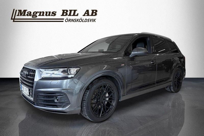 Grå Begagnad 2017 Audi Q7 S-Line SUV | 339 900 kr (Marknadspris) - Bild 1/4