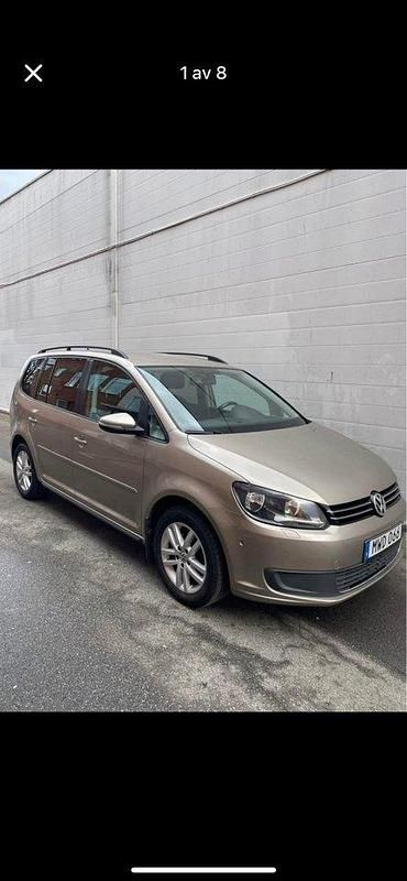 Brun Begagnad 2013 VW Touran Minibuss | 78 000 kr (Bra pris) - Bild 1/4