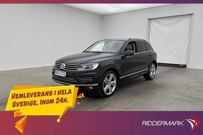 Svart Begagnad 2015 VW Touareg R-line SUV | 219 800 kr (Marknadspris) - Bild 1/3