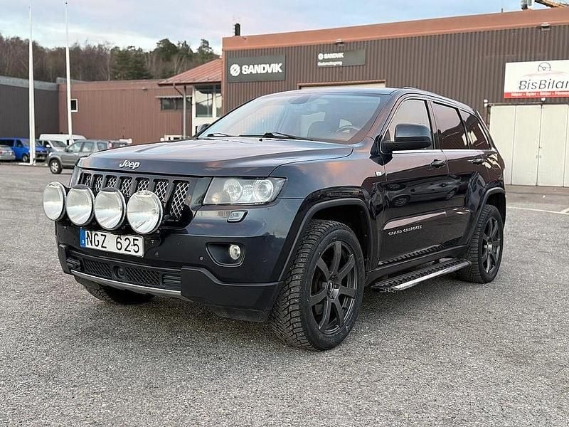 Blå Begagnad 2012 Jeep Grand Cherokee SUV | 129 900 kr (Marknadspris) - Bild 1/4
