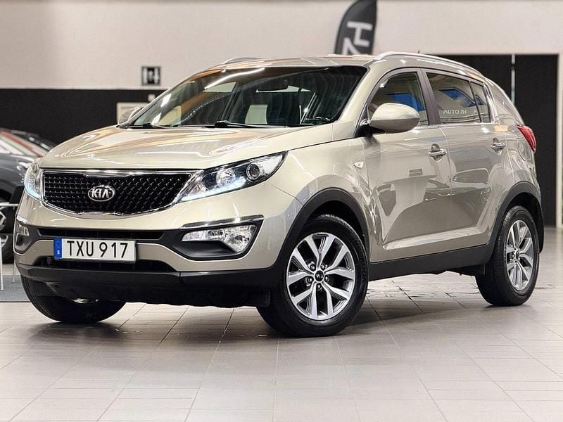 Grå Begagnad 2015 Kia Sportage SUV | 109 900 kr (Marknadspris) - Bild 1/4