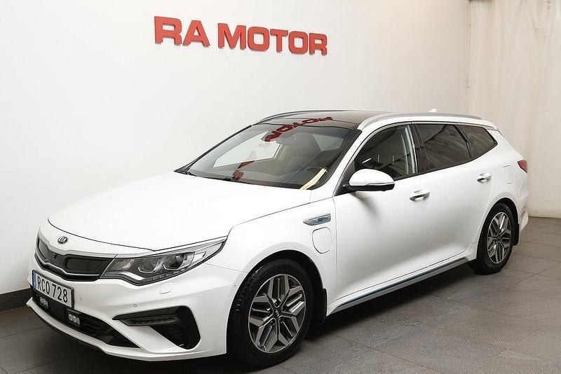 Vit Begagnad 2018 Kia Optima Hybrid 2 Sedan | 189 900 kr (Marknadspris) - Bild 1/3