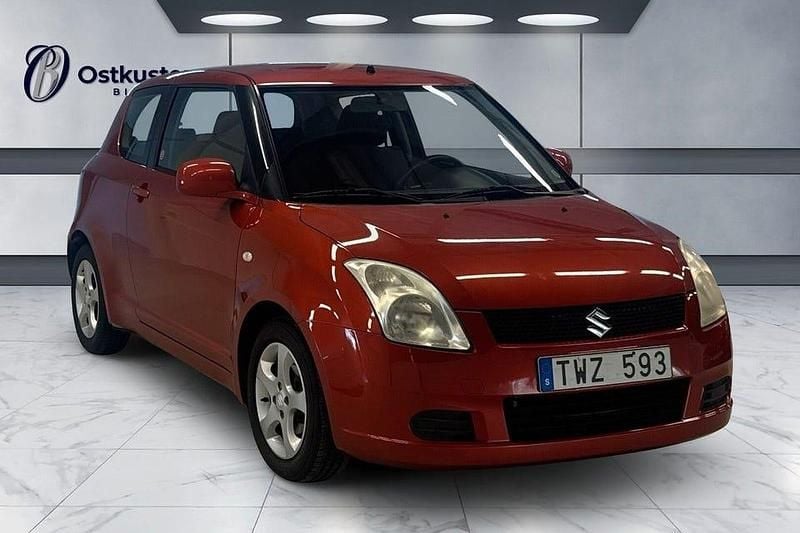 Orange Begagnad 2006 Suzuki Swift Halvkombi | 39 900 kr (Marknadspris) - Bild 1/4