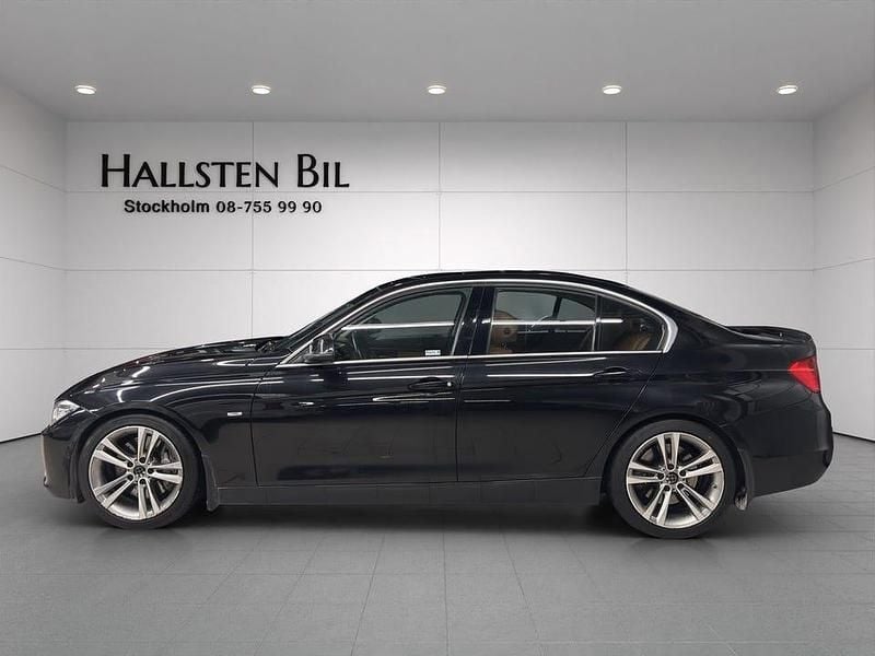 Svart Begagnad 2012 BMW 335 Luxury Line Sedan | 199 000 kr (Bra pris) - Bild 1/4