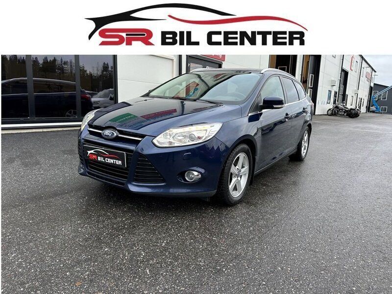 Blå Begagnad 2012 Ford Focus Titanium Kombi | 65 900 kr (Marknadspris) - Bild 1/4