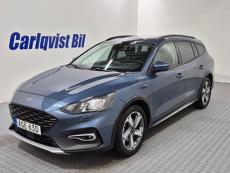 Blå (blå metallic) Begagnad 2022 Ford Focus Active Kombi | 222 000 kr (Marknadspris) - Bild 1/4