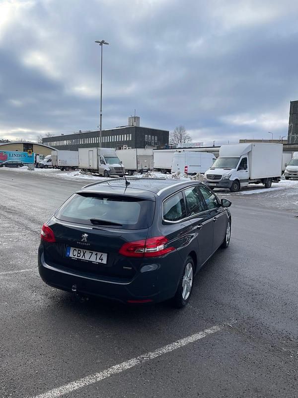 Begagnad Peugeot 308 SW 120 HK (88 kW) 2014 Grå/blå Kombi