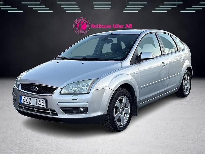 Grå Begagnad 2006 Ford Focus Halvkombi | 22 900 kr (Marknadspris) - Bild 1/4