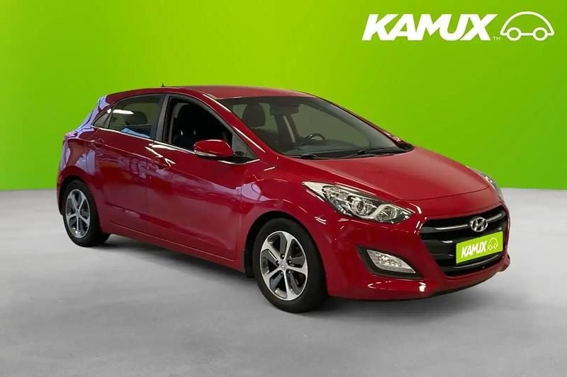 Röd Begagnad 2015 Hyundai i30 Comfort Halvkombi | 89 900 kr (Bra pris) - Bild 1/4
