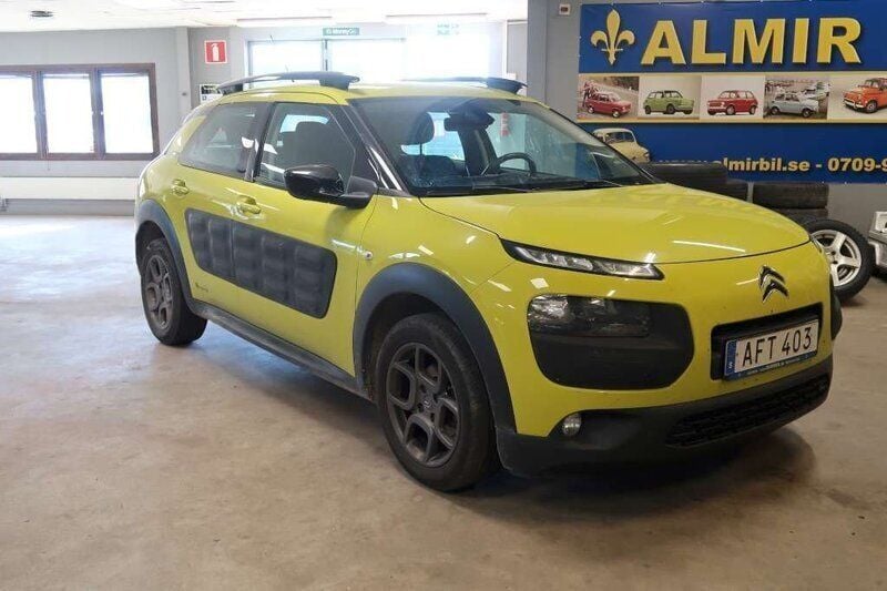 Gul Begagnad 2014 Citroën C4 Cactus PureTech Halvkombi | 79 500 kr (Marknadspris) - Bild 1/3