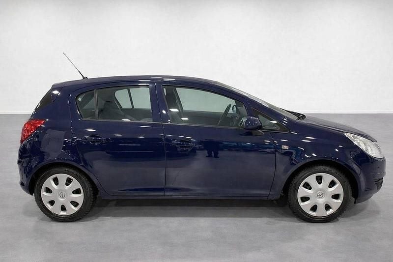 Begagnad Opel Corsa 90 HK (66 kW) 2009 Blå Halvkombi