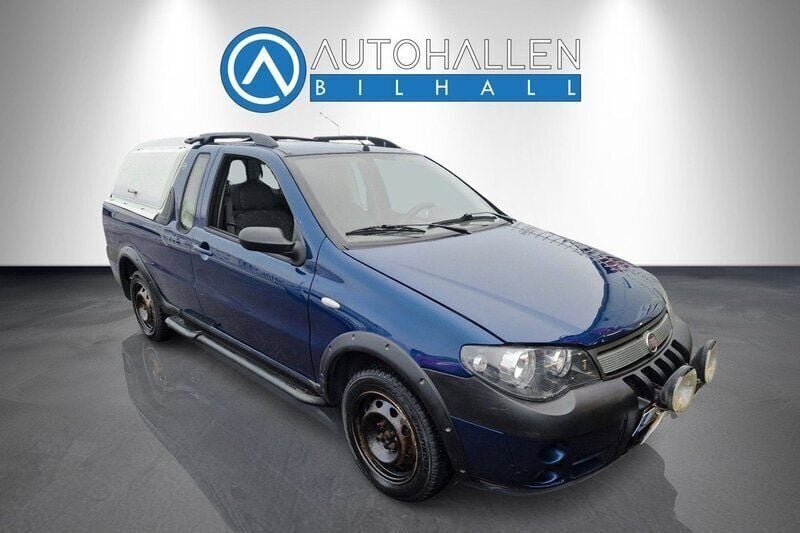 Mörkblå (blå) Begagnad 2009 Fiat Strada Van | 37 996 kr - Bild 1/4