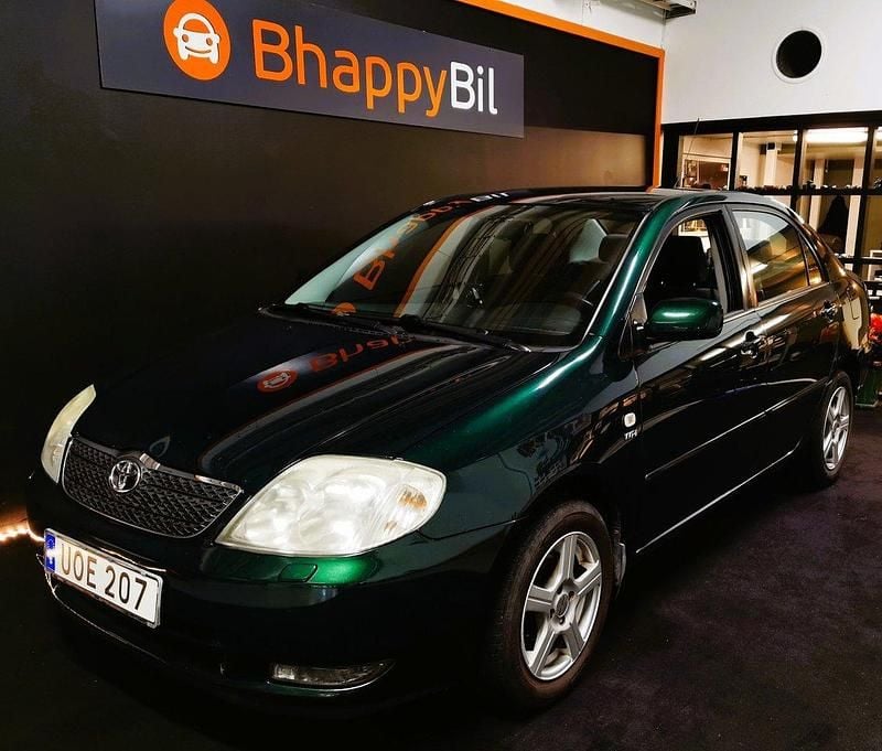 Grön Begagnad 2003 Toyota Corolla Sedan | 23 900 kr (Marknadspris) - Bild 1/4