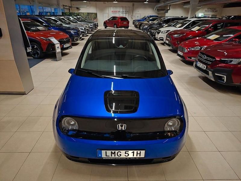 Begagnad Honda e Advance 113 kW (154 HK) 2021 Mörkblå (mblå) Halvkombi