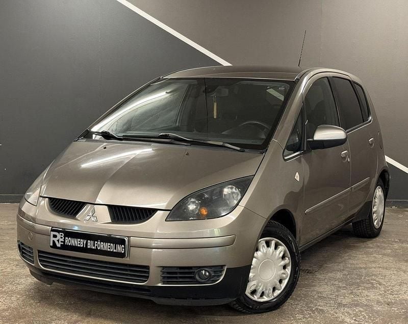 Mörkgrå Begagnad 2008 Mitsubishi Colt Halvkombi | 44 900 kr (Lite dyr) - Bild 1/4