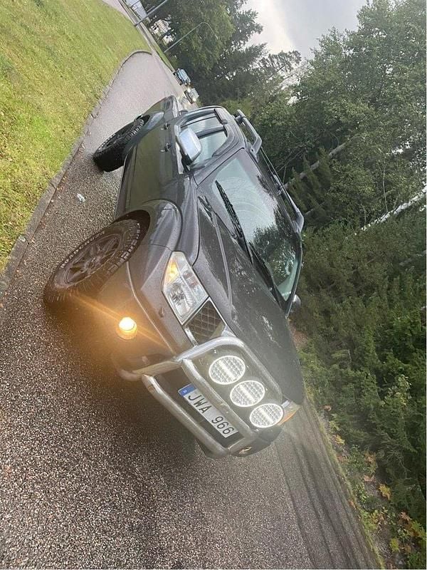 Grå Begagnad 2009 Nissan Navara Pickup | 80 000 kr (Dyr) - Bild 1/4