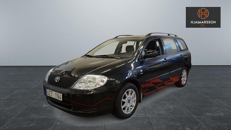 Svart Begagnad 2004 Toyota Corolla Kombi | 49 900 kr (Marknadspris) - Bild 1/4