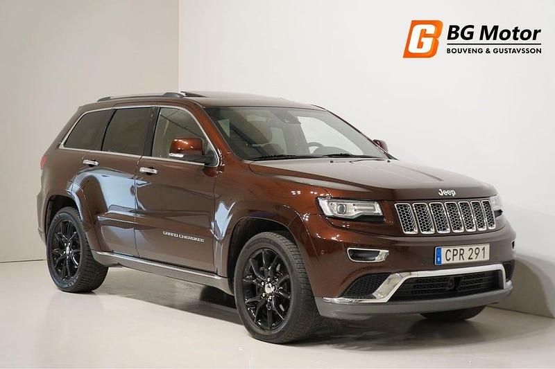 Brun Begagnad 2014 Jeep Grand Cherokee Summit SUV | 219 600 kr (Marknadspris) - Bild 1/3