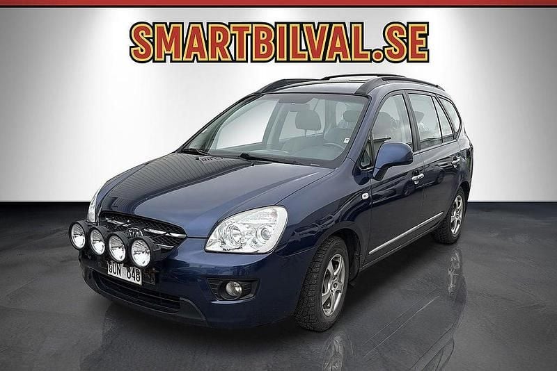 Blå Begagnad 2007 Kia Carens Minibuss | 39 900 kr (Marknadspris) - Bild 1/4