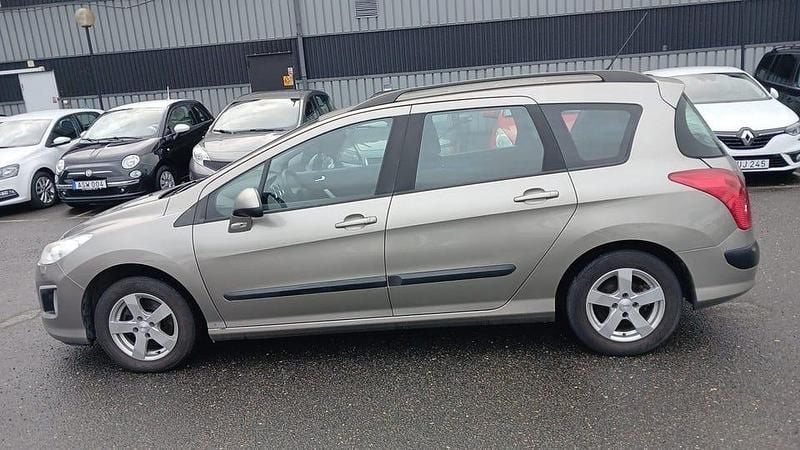 Begagnad Peugeot 308 SW 120 HK (88 kW) 2013 Grå Kombi