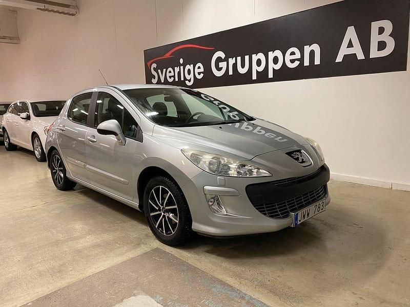 Ljusgrå (grå) Begagnad 2009 Peugeot 308 Halvkombi | 59 900 kr (Marknadspris) - Bild 1/4