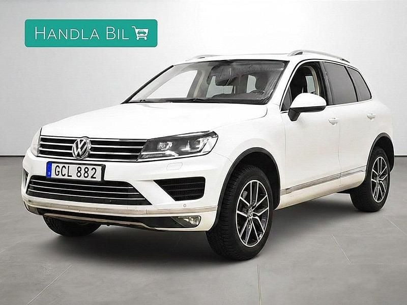 Vit Begagnad 2015 VW Touareg SUV | 189 900 kr (Marknadspris) - Bild 1/4