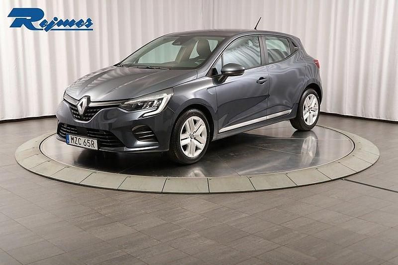 Grå titanium kpn met Begagnad 2022 Renault Clio V Zen Halvkombi | 149 800 kr (Marknadspris) - Bild 1/4