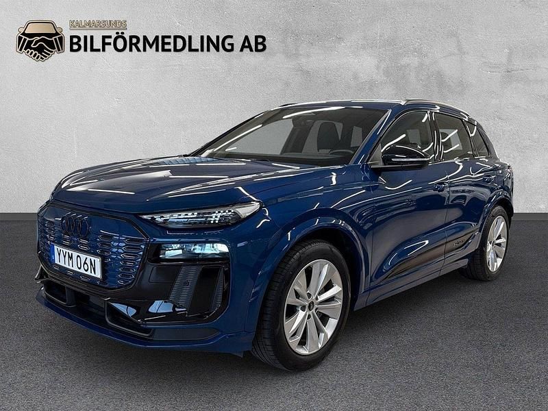 Blå Begagnad 2024 Audi Q6 e-tron S-Line SUV | 829 800 kr (Marknadspris) - Bild 1/4