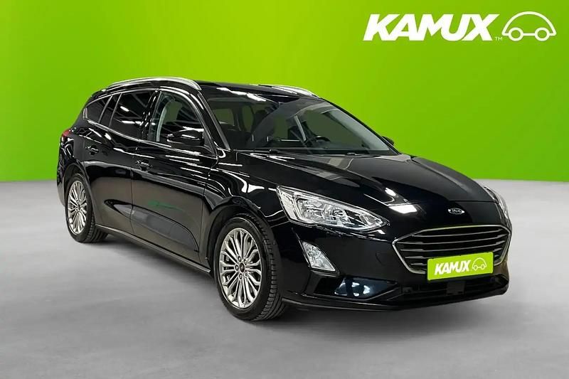 Svart Begagnad 2019 Ford Focus Titanium Kombi | 134 800 kr (Marknadspris) - Bild 1/4