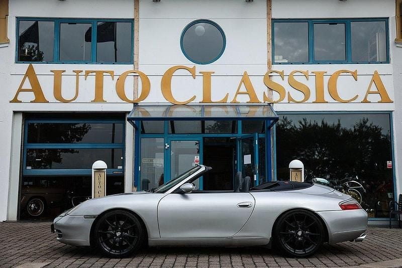 Mörkblå metallic Begagnad 2000 Porsche 911 Carrera Cabriolet Cab | 249 000 kr - Bild 1/4